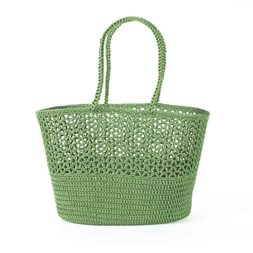 Green woven basket bag on a white background.