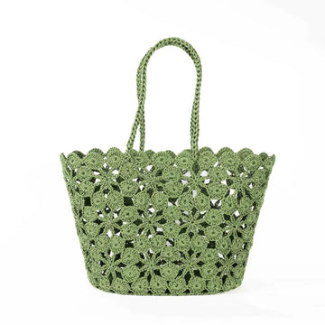 Green crochet basket on a white background.