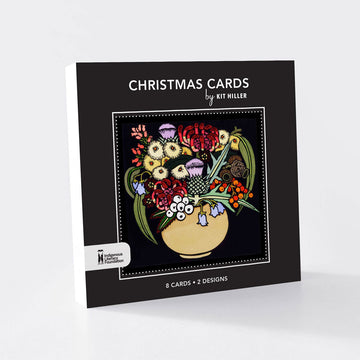 Pack of Christmas cards with floral design on a black background.