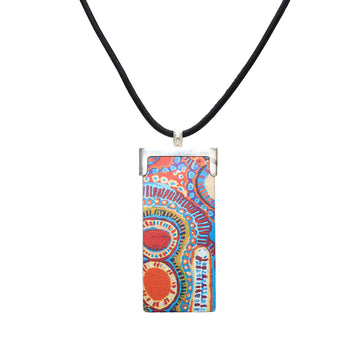 A rectangle pendant on a black cord. The pendant is printed with artwork by Murdie Morris.