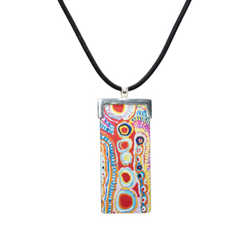 A rectangle shaped pendant on a black cord. The pendant is printed with artwork by Murdie Morris.