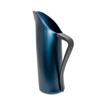 A jug in stainless steel in a dark blue colour with a black handle.