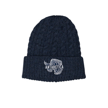 Dark blue knit beanie with Antarctica logo on a white background.
