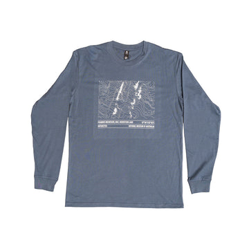 Blue long-sleeve shirt with a white graphic on a white background.