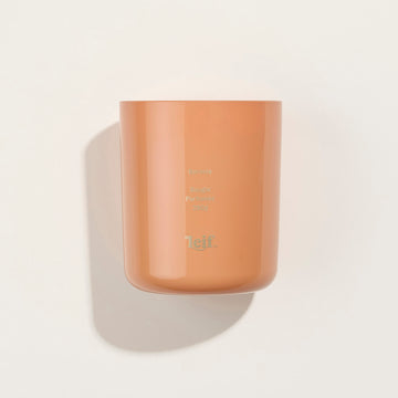 Front view of an orange glass candle with the text 'Boronia Bougie Parfumee 280g' and the Leif logo.