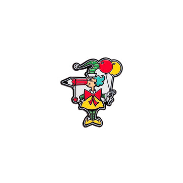 A metal magnet shaped like Mr Squiggle holding balloons.