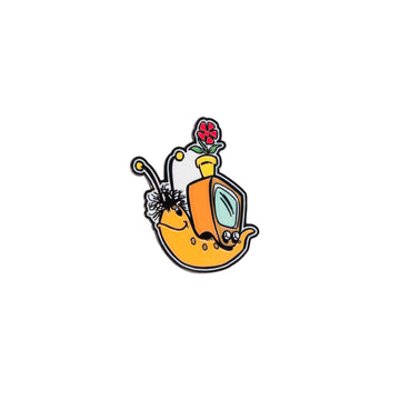 A metal magnet shaped like Gus the Snail from Mr Squiggle.