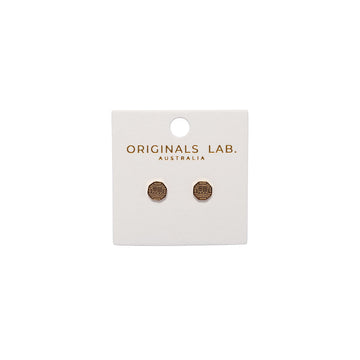 Gold earrings on a 'Originals Lab Australia' branded card against a white background