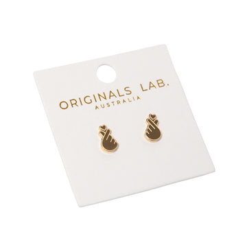 Pair of earrings shaped like a finger heart on a 'Originals Lab. Australia' branded card.