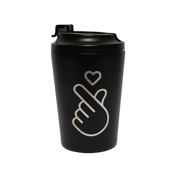 A black travel mug with an image of a hand making a heart gesture. 
