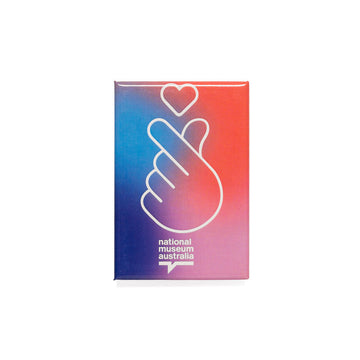 A rectangle magnet with a colourful gradient background and a white line drawing of a hand making a heart gesture.