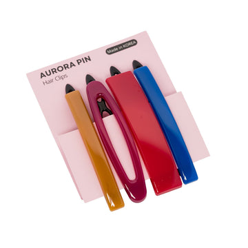 Set of colorful hair clips on a pink card with 'Aurora Pin' branding.