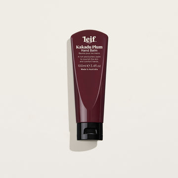 Hand Balm by Leif. 75ml Kakadu Plum. A dark maroon tube with a black pop top lid and whote text.