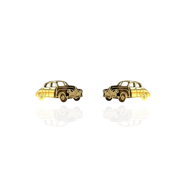 A pair of gold stud earrings shaped like a Holden car.