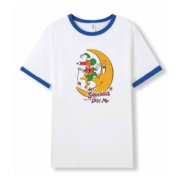 Front view of a white tshirt with blue trim around the sleeves and collar. There is an illustration of Mr Squiggle sitting on the moon.