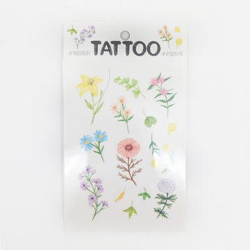 Sheet of temporary tattoos with floral designs on a white background.