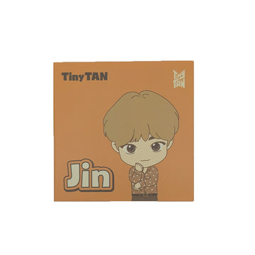 Cartoon character of Jin from BTS on an orange background.