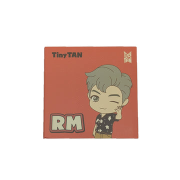 Card with a cartoon character and 'TinyTAN' branding on a red background.