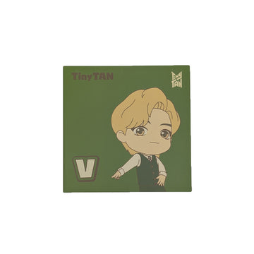 Product packaging with a cartoon character and 'Tiny Tan' branding on a green background.