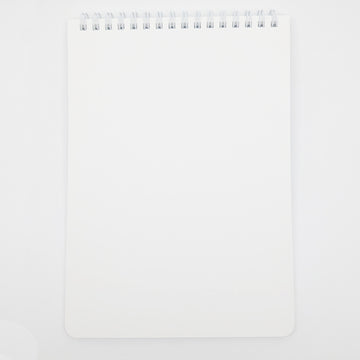 Black notebook with colorful character illustrations and text on a white background.