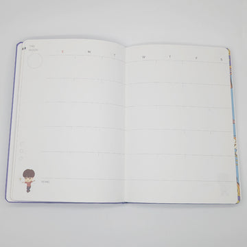 Purple notebook with cartoon character and text on a white background.