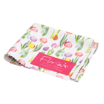 A lens cloth folded up and printed with watercolour tulips in different colours.