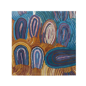 A square greeting card printed with artwork of blue and orange arche.