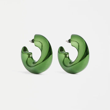 Green hoop earrings on a white background.