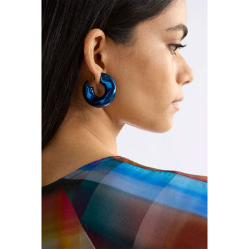 Green hoop earrings on a white background.