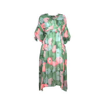A dress printed with a pink and green floral print.