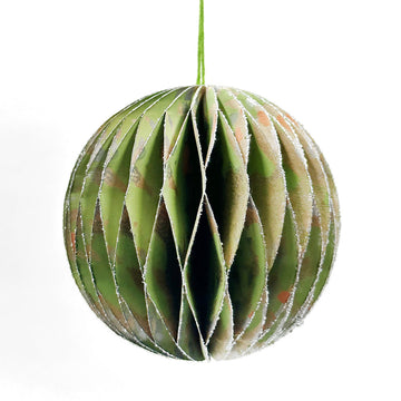 A honeycomb ball with layers printed with artwork by Rosie Ross.