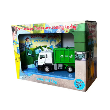 A truck toy and book inside a box with the front cut out.