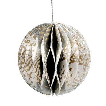 A honeycomb ball with layers printed with artowrk by Simplicia Tipungwuti.