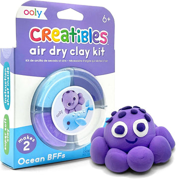 A packet titled 'Creatibles Air Dry Clay Kit' with four different coloured clay in a container and a purple octopus made from clay.