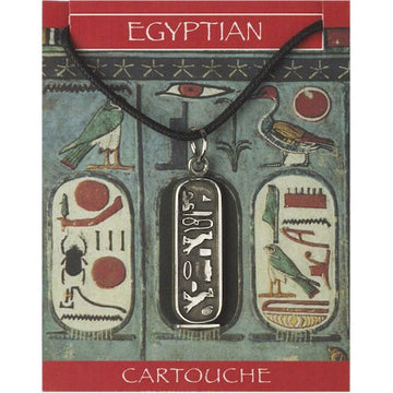 An oval rectangle pendant with Egyptian symbols on it attached to a black cord necklace on a backing card printed with more Egyptian symbols.