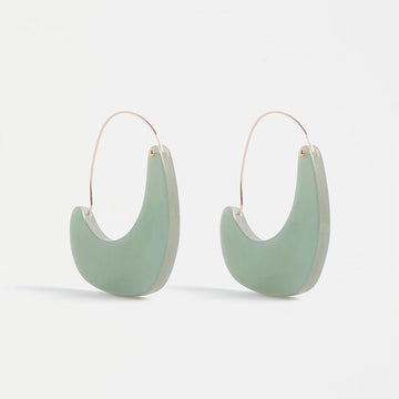 A Jade Green crescent shaped earring with a hinged hoop.
