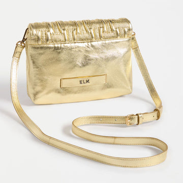 Gold textured clutch bag on a light gray background.