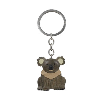 A timber keyring in the shape of a koala in a sitting pose.