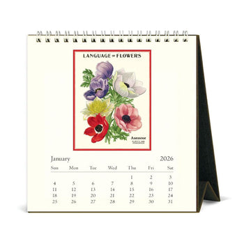 A desk calendar titled 'Language of Flowers 2026'with an illustration of tulips.
