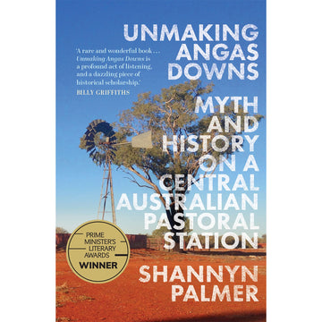'Unmaking Angas Downs' book cover featuring a photo of a tree and windmill in the desert.