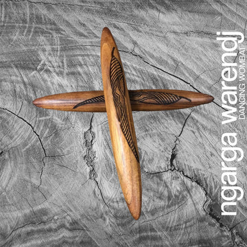 A pair of wooden clapsticks engraving with leaf designs.