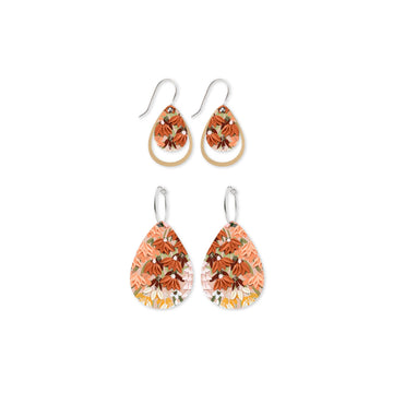 Two pairs of tear drop shaped earrings printed with orange floral artwork.