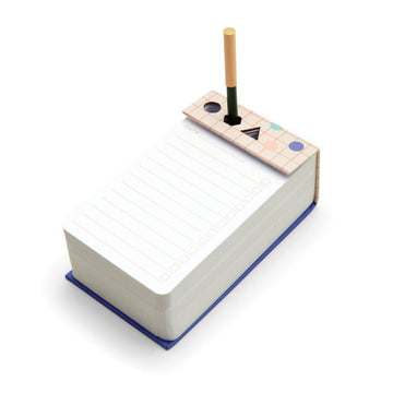 Kikkerland desk jotter pad and pen set packaging with geometric design and pen stand illustration.