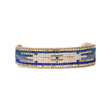 Beaded bracelet with blue and gold pattern on a white background.