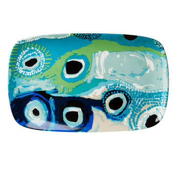 Top down view of a rectangular platter printed with artwork by May Wokka.