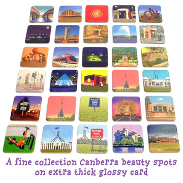 A cube shaped blue box with the title 'Canberra Memory Game' on the side and tile illustrations of Canberra by Trevor on the top and side.