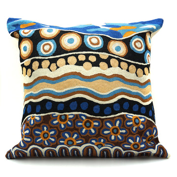A square cushion made from wool and printed with artwork by Bianca Gardiner-Dodd.