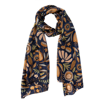 A silk scarf printed with flowers and leaves in orange and navy.