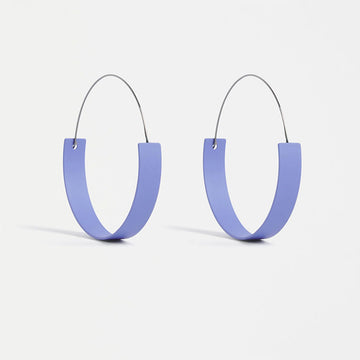 A pair of hooped earrings with a rounded flat bottom in Cornflower Blue.