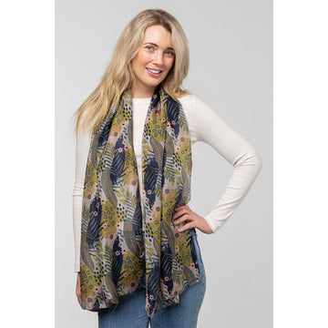 A silk scarf printed with flowers and leaves in navy, green and pink.